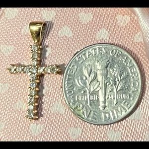 Gold and diamond cross pendant